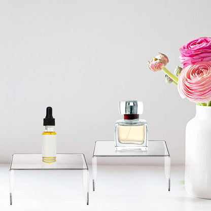 Grapas minis transparentes para exhibir perfumes